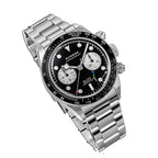 Sugess S457 black dial manual chronograph, white sub-dials, steel bracelet, angled view on black