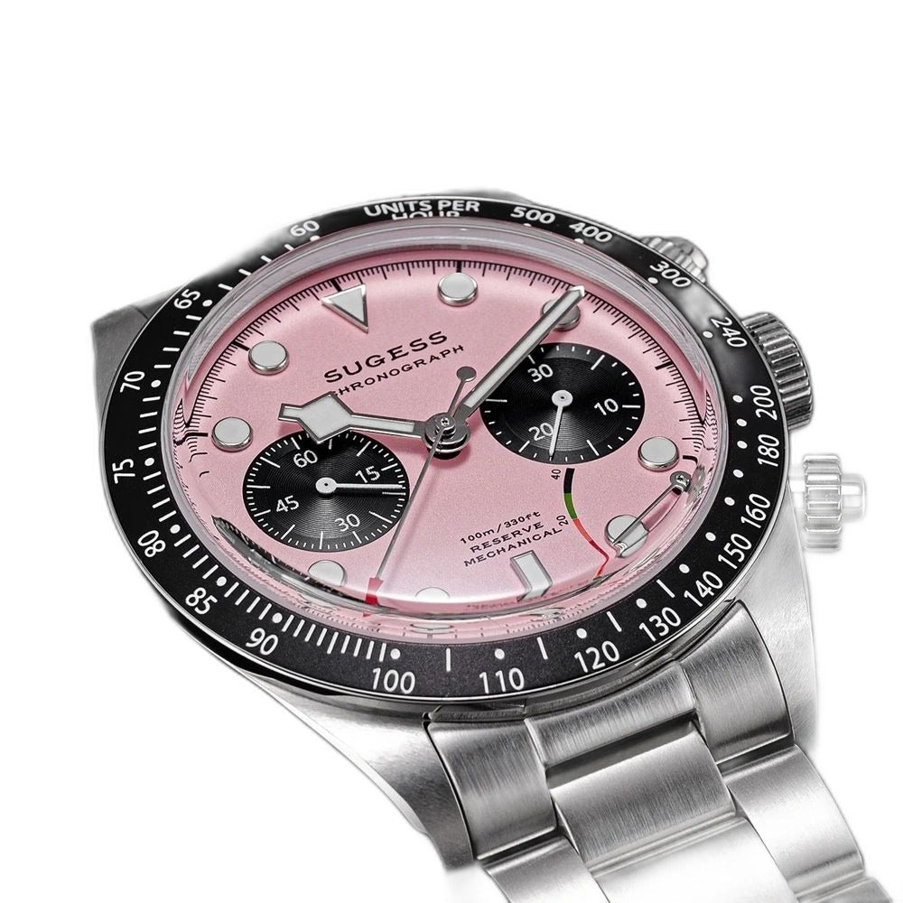 Sugess S457 pink dial manual chronograph, black sub-dials, steel bracelet, angled view with clasp visible
