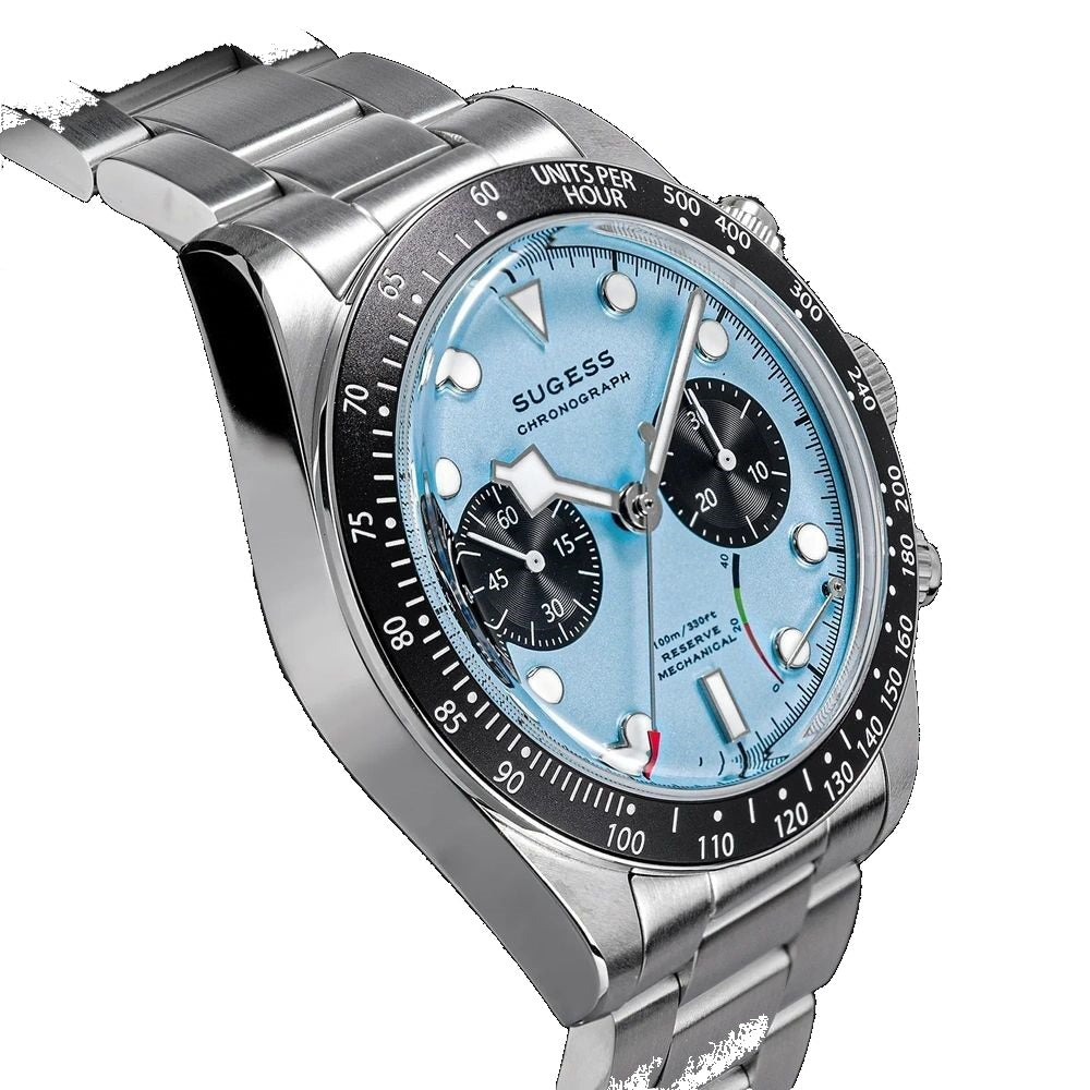 Sugess S457 teal blue dial manual chronograph, black sub-dials, steel bracelet, dynamic angled view on black