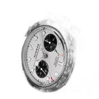 Sugess S457 silver panda dial manual chronograph, black sub-dials, steel bracelet, three-quarter angle on black