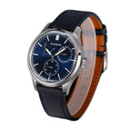 Sugess S458 blue dial power-reserve watch, navy leather strap, front three-quarter view on black