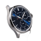 Sugess S458 blue dial power-reserve watch, navy leather strap, dramatic angled view on black
