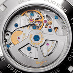 Sugess S458 automatic movement close-up through the display back, twenty-nine jewels, power reserve, blued screws