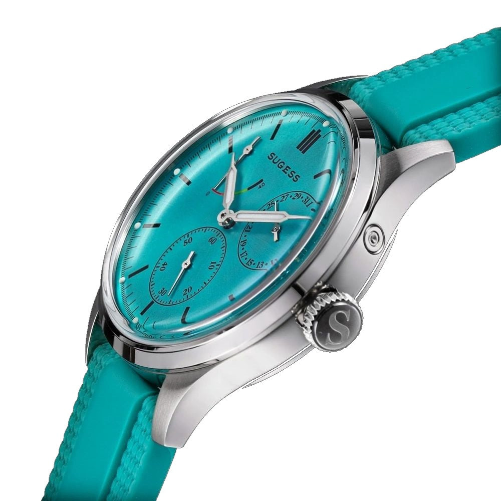 Sugess S458 petrol teal dial power-reserve watch, teal rubber strap, three-quarter angled view on black