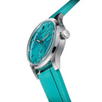 Sugess S458 petrol teal dial power-reserve watch side profile, S-engraved crown, teal rubber strap, on black