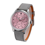 Sugess S458 pink dial power-reserve watch, grey suede strap, angled view with crown to the right, on black