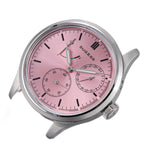 Sugess S458 pink dial power-reserve watch, grey suede strap, front three-quarter tilt on black