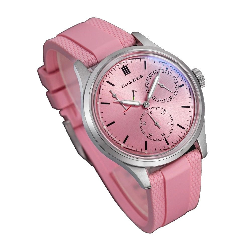 Sugess S458 pink dial power-reserve watch, pink rubber strap, three-quarter angled view on black
