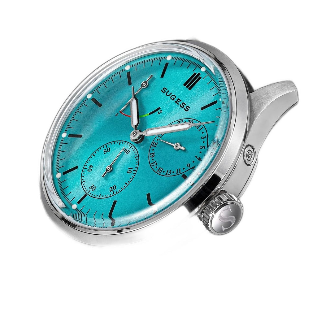 Sugess S458 silver sunburst dial power-reserve watch, grey suede strap, three-quarter angled view on black