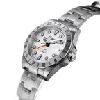 Sugess S463 white-dial GMT automatic watch, steel oyster bracelet, three-quarter studio angle on white