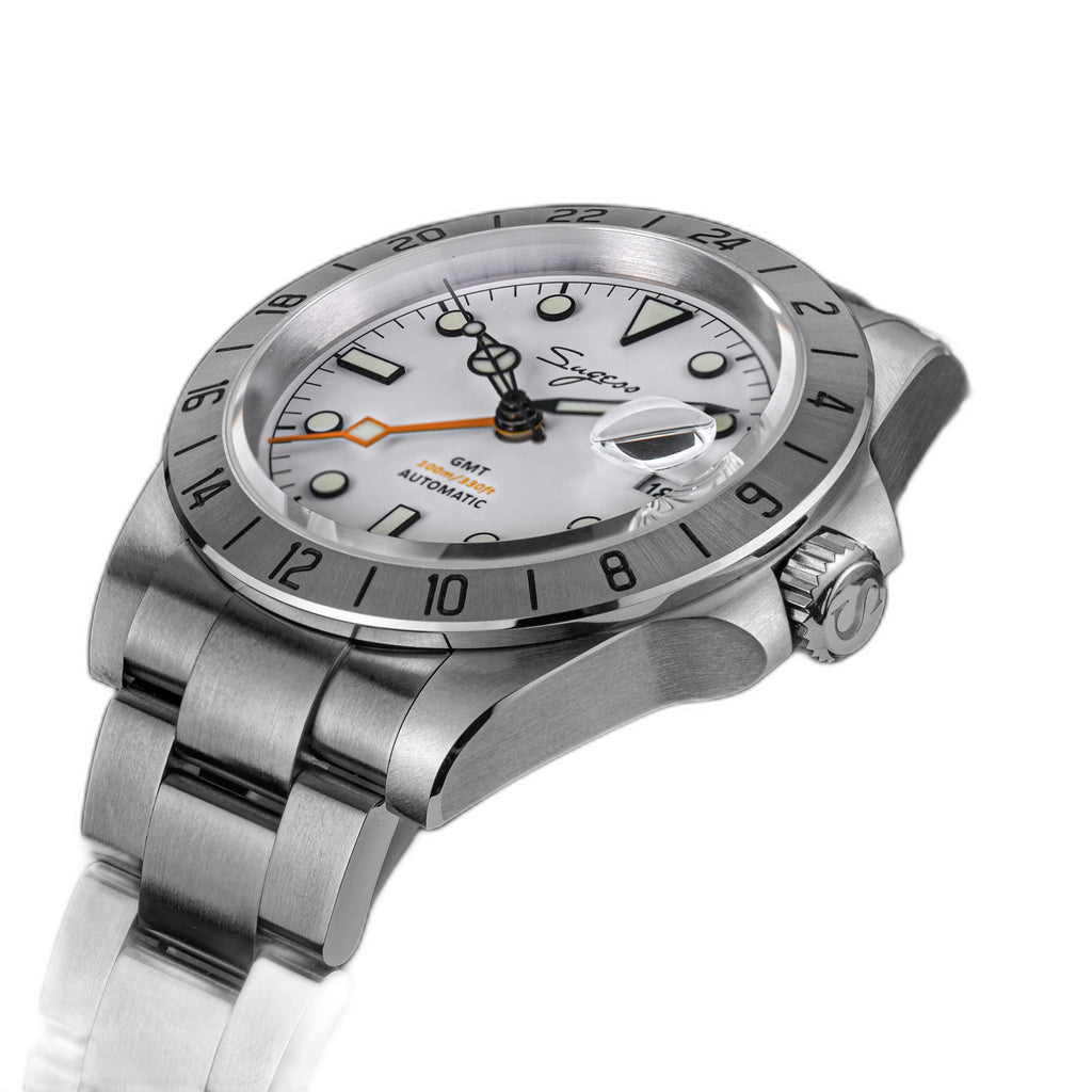 Sugess S463 white-dial GMT automatic watch, cyclops date lens and S crown visible, three-quarter angle