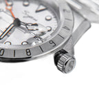 Sugess S463 white-dial GMT automatic watch, steel oyster bracelet, three-quarter angled view on white