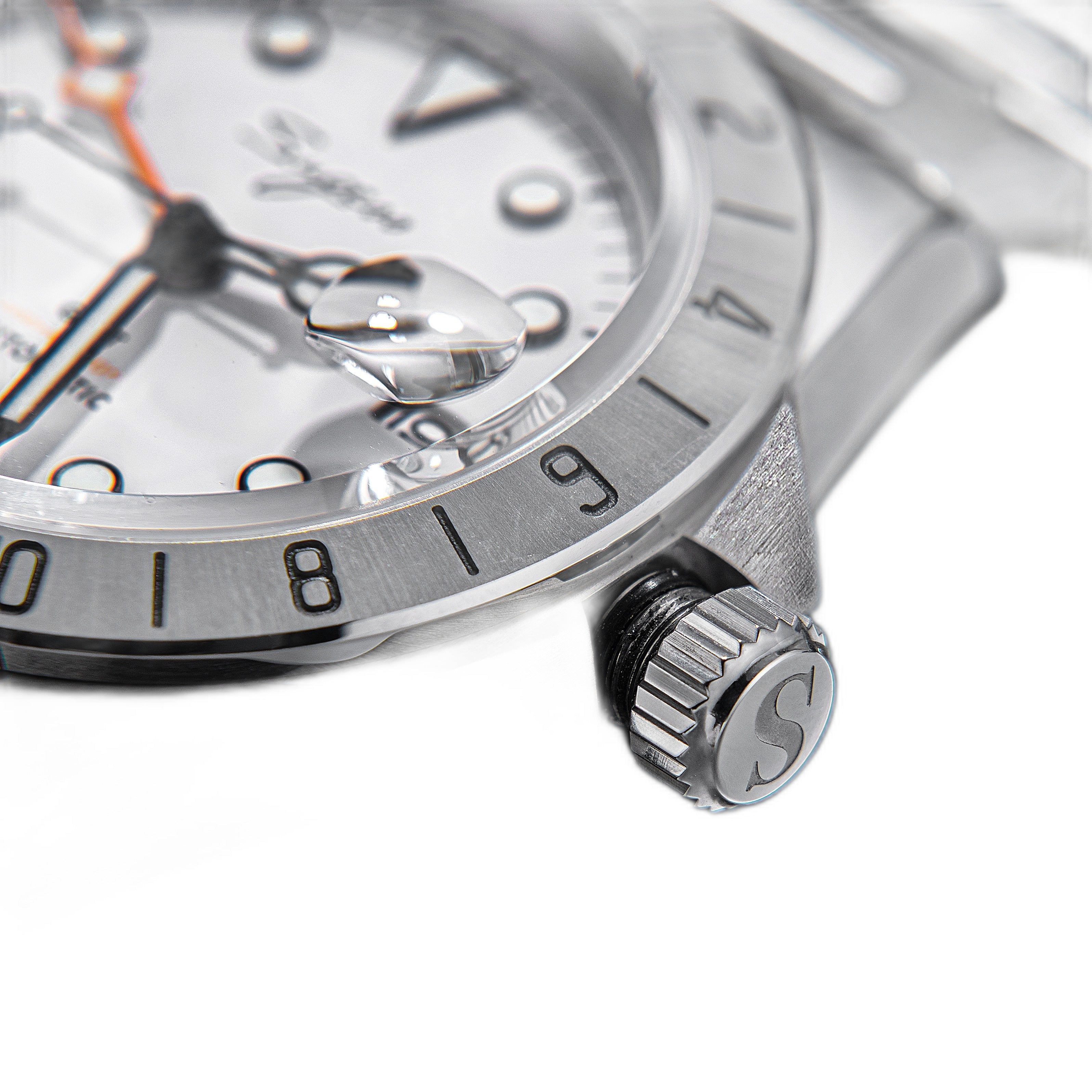 Sugess S463 white-dial GMT automatic watch, steel oyster bracelet, three-quarter angled view on white