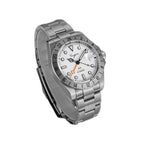 Sugess S463 white-dial GMT automatic watch, steel bracelet, angled studio view, orange GMT hand visible