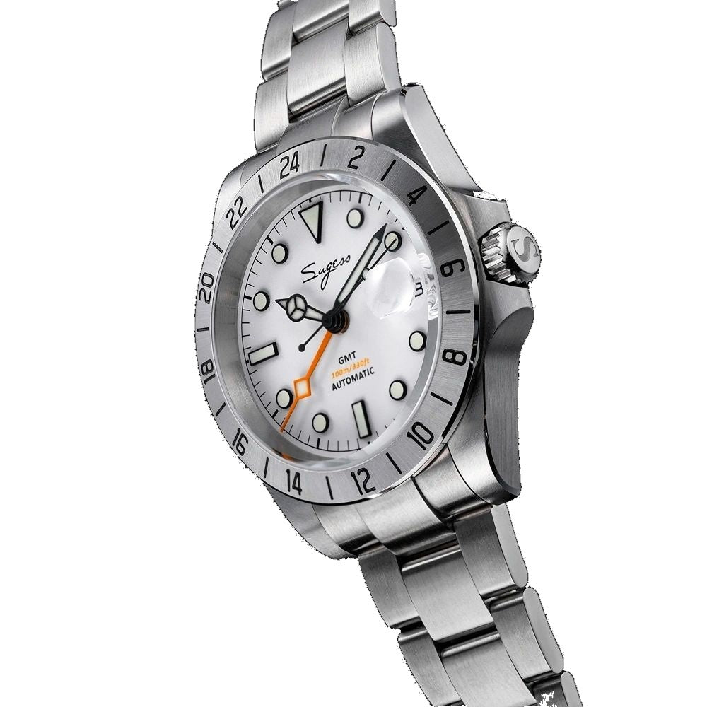 Sugess S463 GMT white dial watch, orange GMT hand, steel bracelet, three-quarter angled view on black