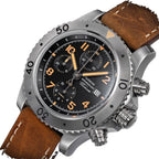 Sugess S464 titanium chronograph black dial with beige numerals, brown leather strap, three-quarter angle on black