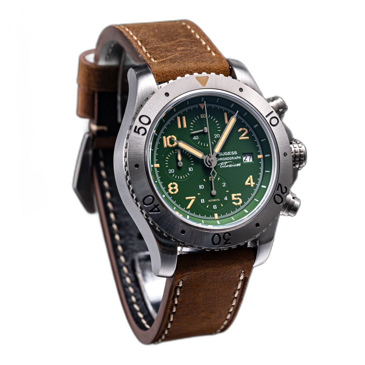 Sugess S464 titanium chronograph green dial, chronograph pushers, brown leather strap, angled view on black