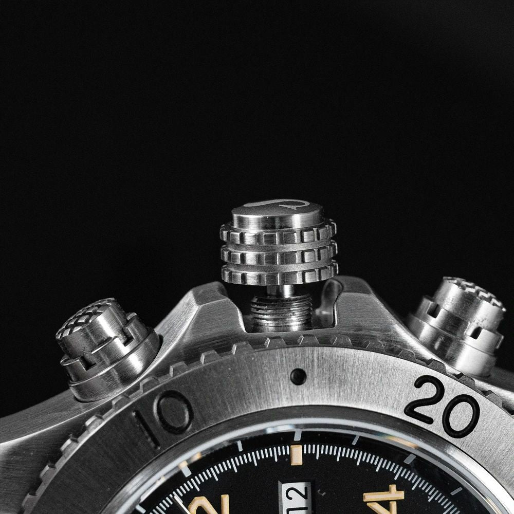 Sugess S464 titanium chronograph screw-down crown flanked by two chronograph pushers, macro close-up on black