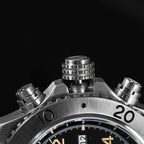 Sugess S464 titanium chronograph screw-down crown flanked by two chronograph pushers, macro close-up on black