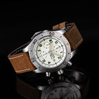 Sugess S464 titanium chronograph full-lume cream dial side profile, pushers and crown, brown strap, on black