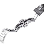 Sugess S466 integrated steel bracelet folding clasp, signed, close-up on black