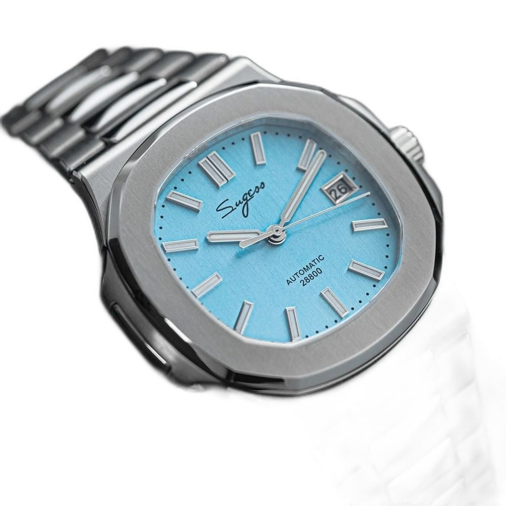 Sugess S466 ice blue dial sport watch resting on a black glove, integrated steel bracelet, angled view