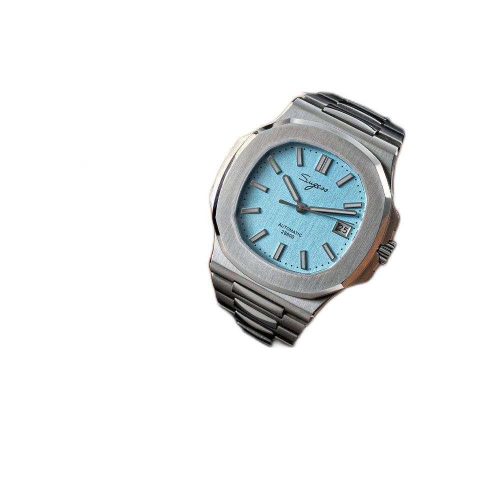 Sugess S466 ice blue dial sport watch worn on the wrist with a navy and grey jumper, steel bracelet