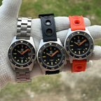 Three STEELDIVE SD1929V watches on a steel bracelet, black rubber and orange rubber straps