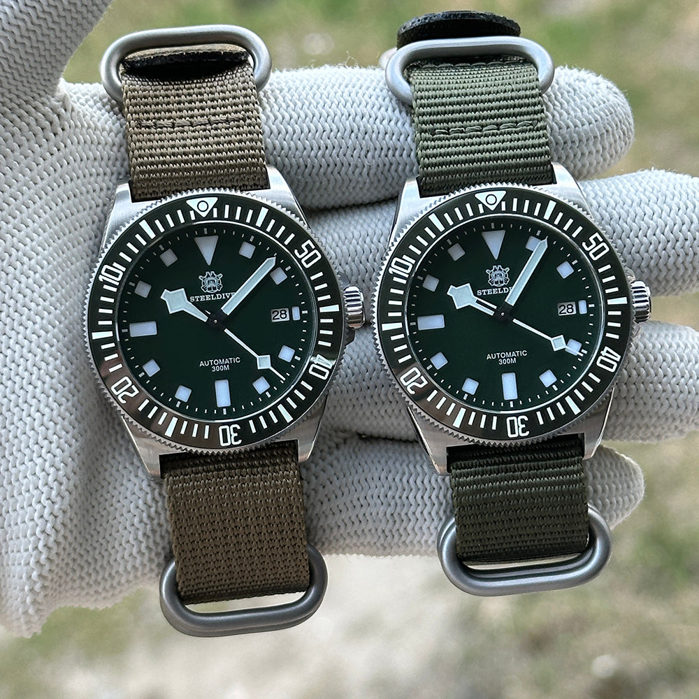 Two STEELDIVE SD1925 watches side by side on khaki and army green nylon straps