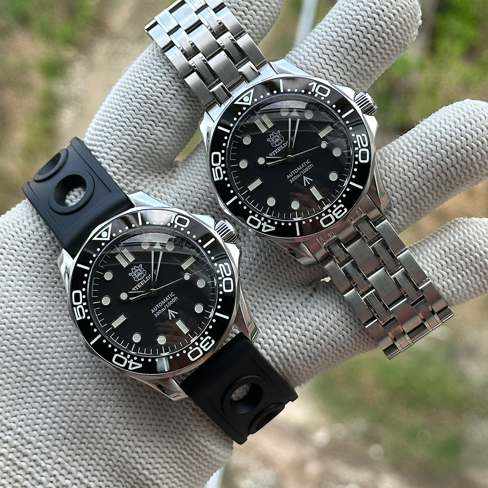 Two STEELDIVE SD1957L watches, one on a black rubber strap and one on a steel bracelet